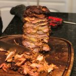 "Tacos al Past-o-roti" - Mexican kebabs ! Stack of pork and pineapple still on the Joetisserie skewer and part way through carving.