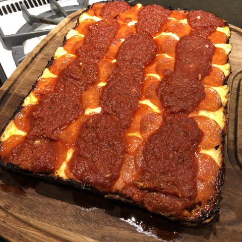 A finished Detroit Style Pizza